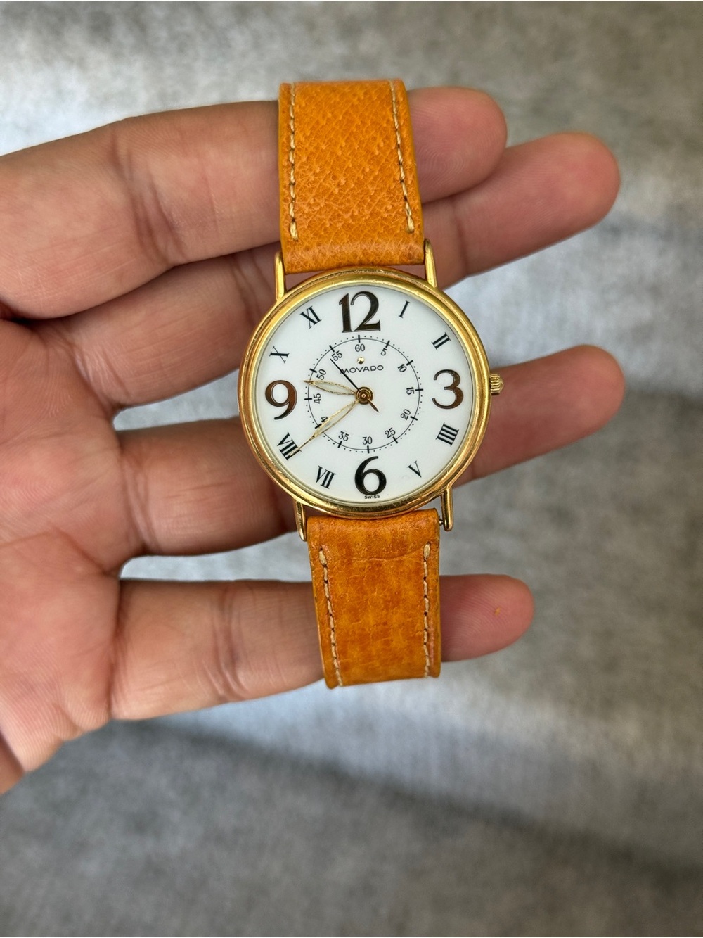 Movado vintage  Men's Gold classic thin with brownish orange Leather Swiss Watch
